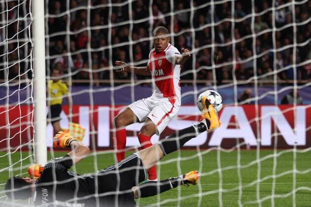 May 3, 2017 - Monaco, Monaco - Monaco forward Kylian Mbappe (29) shoots the ball and Juventus goalkeeper Gianluigi Buffon (1) dives for the ball during the Uefa Champions League semi finals football match MONACO - JUVENTUS on 03 05 2017 at the Stade Louis II in Monaco, Monaco. AS Monaco v Juventus - UEFA Champions League Semi Final: First Leg  - ZUMAn230 20170503_zaa_n230_268 Copyright: xMatteoxBottanellix