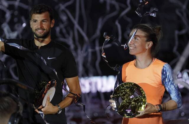 Romanian tennis player Simona Haelpp (R) and Bulgarian Grigor Dimitrov pose with the trophy of the Mutua Charity Tie Break Tens against gender violence at the Magic Box in Madrid, Spain, 04 May 2017. MUTUA CHARITY TIE BREAK TENS !ACHTUNG: NUR REDAKTIONELLE NUTZUNG!  Copyright: xJuanJoxMartínx MAD001 20170505-636295395508418041
