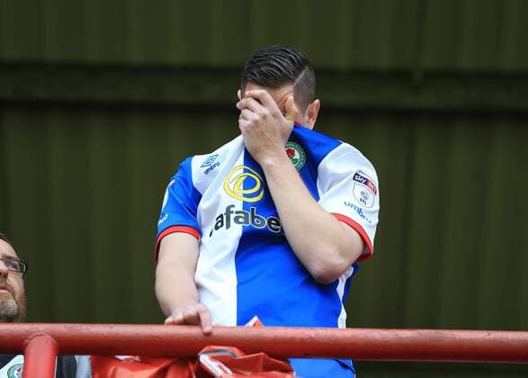 May 7th 2017, Griffin Park, Brentford, Middlesex, England; EFL Championship football Brentford versus Blackburn Rovers; Blackburn Rovers fans in tears as Blackburn Rovers are relegated from EFL Championship to EFL League 1 xJohnxPatrickxFletcherx  ActionPlus11876438