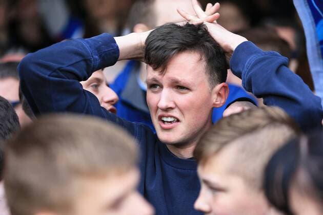 May 7th 2017, Griffin Park, Brentford, Middlesex, England; EFL Championship football Brentford versus Blackburn Rovers; Blackburn Rovers fan hands on head in tears after Blackburn Rovers are relegated from EFL Championship to EFL League 1 xJohnxPatrickxFletcherx  ActionPlus11876465