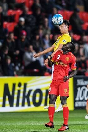 A player of China s Jiangsu Suning FC, back, heads the ball against Roger Mart¨ªnez of Australia s Adelaide United FC in their Group H match during the 2017 AFC Champions League in Adelaide, Australia, 9 May 2017. Local Caption Adelaide United FC competes against Jiangsu Suning at 2017 AFC Champions League  20170509_30955