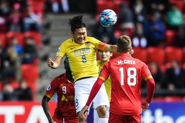 Liu Jianye of China s Jiangsu Suning FC, left, challenges Riley McGree of Australia s Adelaide United FC in their Group H match during the 2017 AFC Champions League in Adelaide, Australia, 9 May 2017. Adelaide United FC competes against Jiangsu Suning at 2017 AFC Champions League  20170509_82344