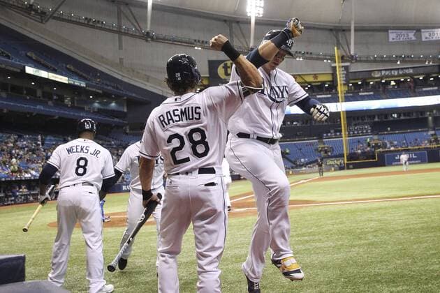 May 9, 2017 - St. Petersburg, Florida, U.S. - WILL VRAGOVIC Times.Tampa Bay Rays center fielder Colby Rasmus (28) high fives Tampa Bay Rays first baseman Logan Morrison (7) after his two run home run in the first inning of the game between the Kansas City Royals and the Tampa Bay Rays at Tropicana Field in St. Petersburg, Fla. on Tuesday, May 9, 2017. Florida News - May 9, 2017 - ZUMAs70_ 20170509_zan_s70_028 Copyright: xWillxVragovicx