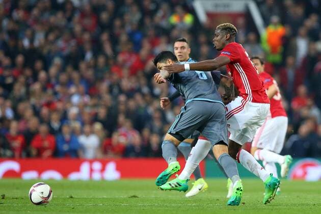 Football - 2016 2017 UEFA Europa League - Semi-Final, Second Leg: Manchester United ManU 1 vs. Celta Vigo 0 Pablo Hernandez of Celta De Vigo is tackled by Paul Pogba of Manchester United COLORSPORT LYNNE CAMERON 