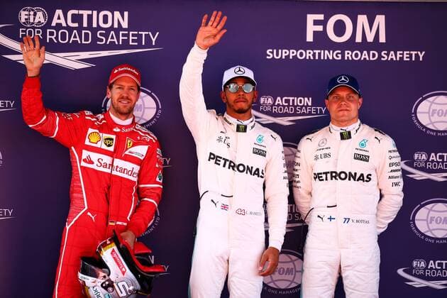 Spanish Grand Prix, Barcelona 11 - 14 May 2017 Qualifying top three in parc ferme (L to R): Sebastian Vettel (GER) Ferrari, second; Lewis Hamilton (GBR) Mercedes AMG F1, pole position; Valtteri Bottas (FIN) Mercedes AMG F1, third. 13.05.2017. 