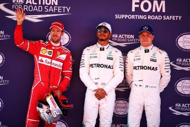 Spanish Grand Prix, Barcelona 11 - 14 May 2017 Qualifying top three in parc ferme (L to R): Sebastian Vettel (GER) Ferrari, second; Lewis Hamilton (GBR) Mercedes AMG F1, pole position; Valtteri Bottas (FIN) Mercedes AMG F1, third. 13.05.2017. 
