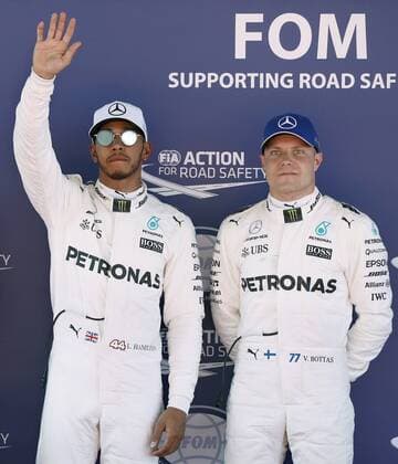 British Formula One driver Lewis Hamilton (L) from Mercedes AMG, and Finnish Valtteri Bottas (R) celebrate their pole position and thrid best time, respectively, after the qualifying session held at the Circuit de Barcelona-Catalunya in Montmelo, near Barcelona, northeastern Spain, 13 May 2017. The 2017 Formula One Grand Prix of Spain will take place on 14 May 2017. Formula One Grand Prix of Spain !ACHTUNG: NUR REDAKTIONELLE NUTZUNG!  Copyright: xANDREUxDALMAUx 20170513-636302897057297873