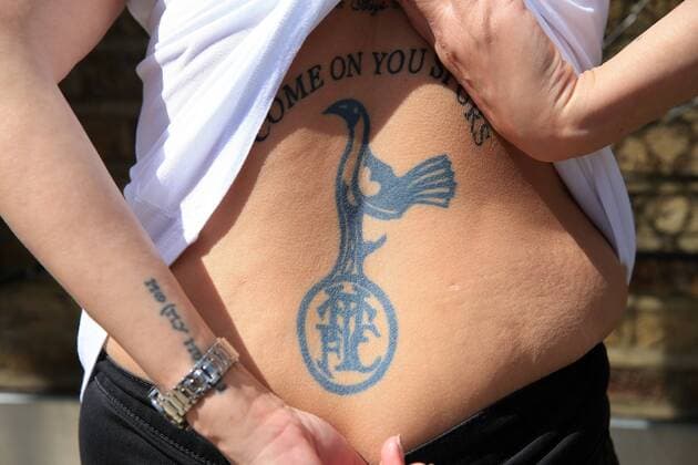 May 14th 2017,White Hart Lane, Tottenham, London, England; EPL Premier League football, Tottenham Hotspur versus Manchester United ManU Spurs fan with giant Tottenham Hotspur crest tattoo on her back xJohnxPatrickxFletcherx  ActionPlus11879577