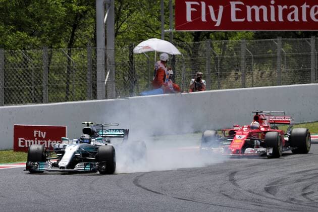 Spanish Grand Prix, Barcelona 11 - 14 May 2017 Valtteri Bottas (FIN) Mercedes AMG F1 W08 and Sebastian Vettel (GER) Ferrari SF70H battle for position. 14.05.2017. 