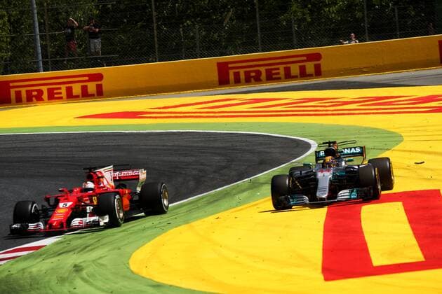 Spanish Grand Prix, Barcelona 11 - 14 May 2017 Sebastian Vettel (GER) Ferrari SF70H and Lewis Hamilton (GBR) Mercedes AMG F1 W08 battle for the lead of the race. 14.05.2017. 