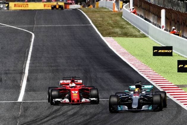Spanish Grand Prix, Barcelona 11 - 14 May 2017 Sebastian Vettel (GER) Ferrari SF70H and Lewis Hamilton (GBR) Mercedes AMG F1 W08 battle for the lead of the race. 14.05.2017. 