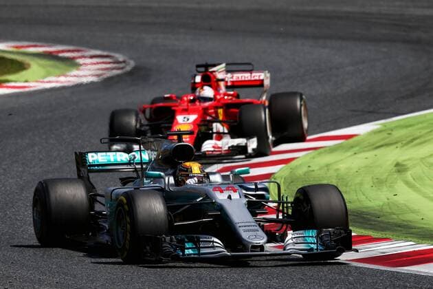 Spanish Grand Prix, Barcelona 11 - 14 May 2017 Lewis Hamilton (GBR) Mercedes AMG F1 W08 leads Sebastian Vettel (GER) Ferrari SF70H. 14.05.2017. 