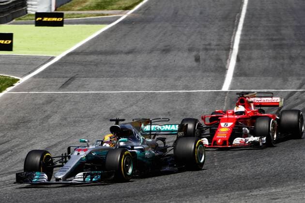 Spanish Grand Prix, Barcelona 11 - 14 May 2017 Sebastian Vettel (GER) Ferrari SF70H and Lewis Hamilton (GBR) Mercedes AMG F1 W08 battle for the lead of the race. 14.05.2017. 