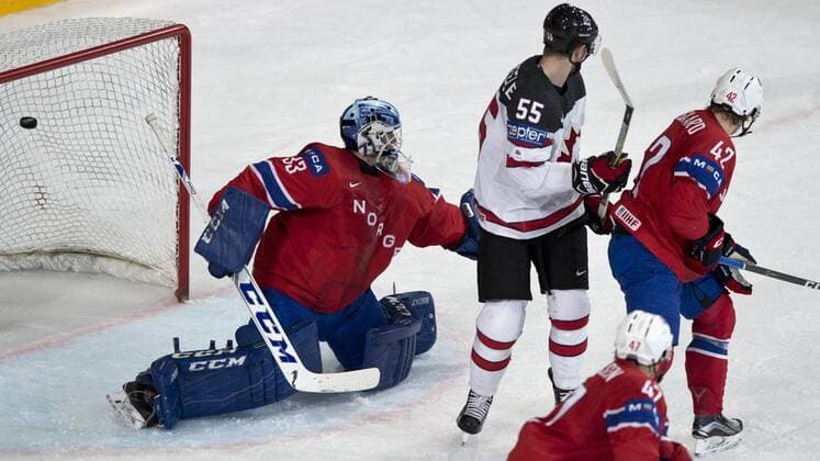 Goalkeeper of Norway Henrik Haukeland scores a second goal, from right: Henrik Odegaard of Norway and Mark Scheifele of Canada in action during the Ice hockey Eishockey World Championships group B match between Canada and Norway in the AccorHotels Arena in Paris, France, Monday, May 15, 2017. (CTKxPhoto MichalxKamaryt) CTKPhotoP201705150806401  kmt 9