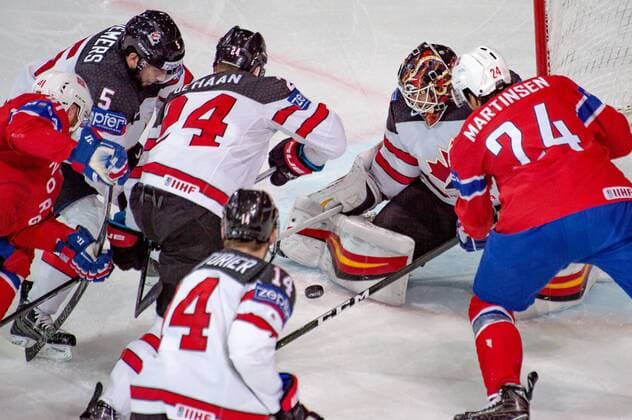 PARIS, FRANCE - MAY 15: 24 Andreas Martinsen (NOR) tries to score against 30 Goalie Chad Johnson (CAN) during the Ice hockey Eishockey World Championship WM Weltmeisterschaft between Canada and Norway at AccorHotels Arena in Paris, France, on May 15, 2017. (Photo by Robert Hradil Icon Sportswire) HOCKEY: MAY 15 IIHF World Championship - Canada v Norway Icon1705150217 EDITORIAL USE ONLY