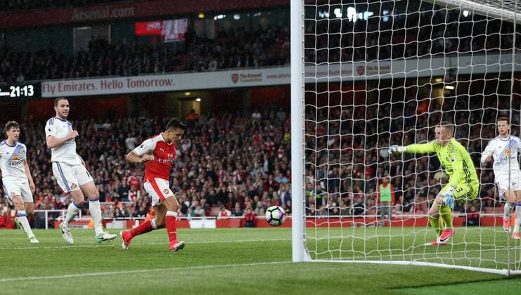 Arsenal s Alexis Sanchez scoring his sides opening goal during the Premier League match at the Emirates Stadium, London. Picture date: May 16th, 2017. Pic credit should read: David Klein Sportimage EDITORIAL USE ONLY. No use with unauthorised audio, video, data, fixture lists, club league logos or live services. Online in-match use limited to 120 images, no video emulation. No use in betting, games or single club league player publications.