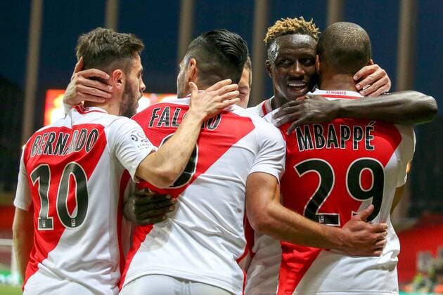 (170518) -- FONTVIEILLE, May 18, 2017 -- Kylian Mbappe (L) of AS Monaco celebrates scoring with teammates during their match against St-Etienne of French Ligue 1 in Fontvieille, Monaco on May 17, 2017. AS Monaco won 2-0 and claimed the championship of the season in advance. ) (SP)FRANCE-MONACO-FONTVIEILLE-SOCCER-LIGUE 1-AS MONACO VS ST ETIENNE SergexHaouzi 
