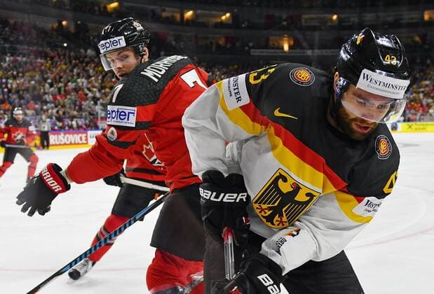 18.05.2017, xblx, Eishockey WM 2017, Kanada - Deutschland, emspor, v.l., Josh Morrissey (Team Canada, Kanada), Gerrit Fauser (Deutschland, DEB) Koeln