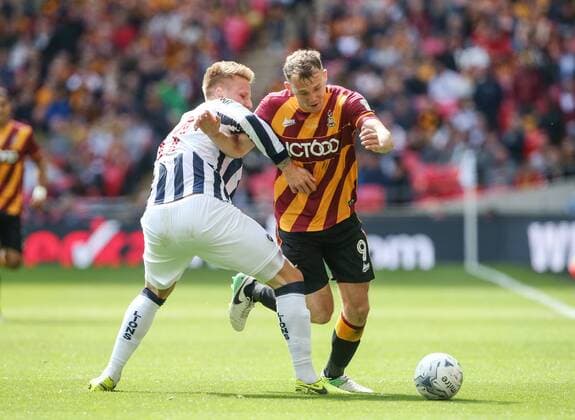 Bradford s Charlie Wyke tussles with Millwall s Byron Webster during the League One Play-Off Final match at Wembley Stadium, London. Picture date: May 20th, 2017. Pic credit should read: David Klein Sportimage EDITORIAL USE ONLY. No use with unauthorised audio, video, data, fixture lists, club league logos or live services. Online in-match use limited to 120 images, no video emulation. No use in betting, games or single club league player publications.