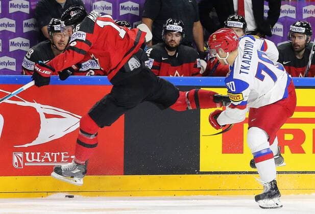 COLOGNE, GERMANY - MAY 20, 2017: Canada s Mitch Marner (L) and Russia s Vladimir Tkachev in their 2017 IIHF Ice hockey Eishockey World Championship WM Weltmeisterschaft semifinal match at Lanxess Arena; Canada won 4-2. Alexander Demianchuk TASS  TS04F6C8