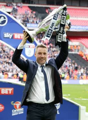 Millwall s Neil Harris celebrates with the trophy during the League One Play-Off Final match at Wembley Stadium, London. Picture date: May 20th, 2017. Pic credit should read: David Klein Sportimage EDITORIAL USE ONLY. No use with unauthorised audio, video, data, fixture lists, club league logos or live services. Online in-match use limited to 120 images, no video emulation. No use in betting, games or single club league player publications.