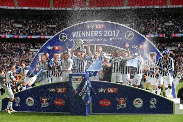 Millwall s players celebrate with the trophy during the League One Play-Off Final match at Wembley Stadium, London. Picture date: May 20th, 2017. Pic credit should read: David Klein Sportimage EDITORIAL USE ONLY. No use with unauthorised audio, video, data, fixture lists, club league logos or live services. Online in-match use limited to 120 images, no video emulation. No use in betting, games or single club league player publications.