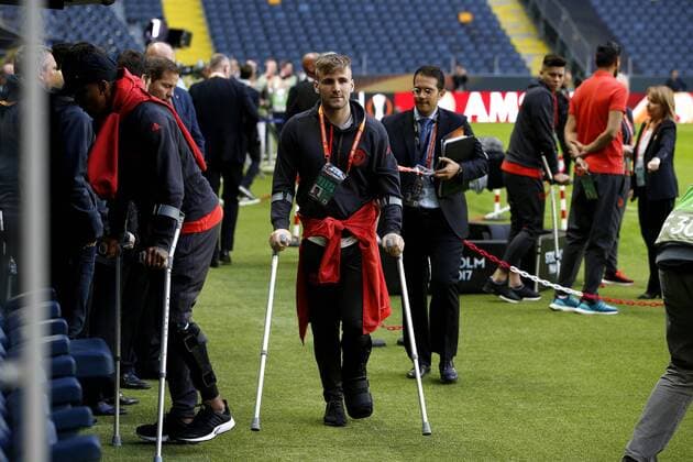 Luke Shaw of Manchester United ManU walks pitchside on crutches ahead of the UEFA Europa League Final at the Friends Arena, Stockholm. Picture date: May 23rd, 2017. Pic credit should read: Matt McNulty Sportimage EDITORIAL USE ONLY. No use with unauthorised audio, video, data, fixture lists, club league logos or live services. Online in-match use limited to 120 images, no video emulation. No use in betting, games or single club league player publications.