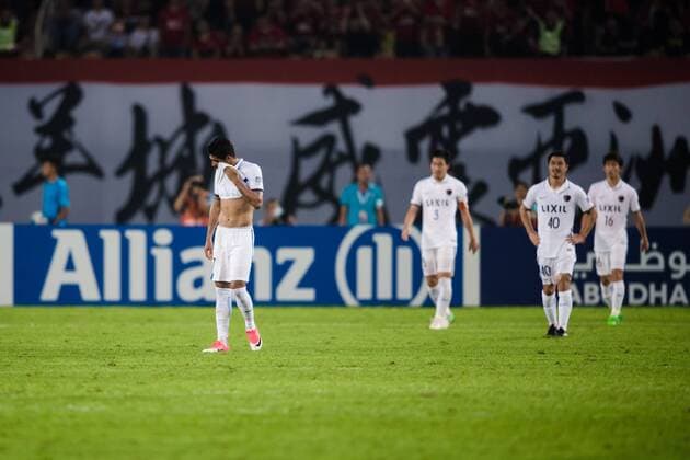 Footballers of Japan s Kashima Antlers react after being defeated by China s Guangzhou Evergrande during their first Round of 16 match of the AFC Champion League 2017 in Guangzhou city, south China s Guangdong province, 23 May 2017. Paulinho s late strike put Guangzhou Evergrande in the driving seat as they beat Kashima Antlers 1-0 in the first leg of their AFC Champions League round of 16 clash on Tuesday (23 May 2017). The ex-Tottenham Hotspur midfielder struck on 75 minutes to reward heavy pressure from Luiz Felipe Scolari s Evergrande, who lifted the Asian title in 2013 and 2015. It was all the Chinese champions deserved against an unambitious Kashima team, who nevertheless will have hopes of overturning the deficit at home in next week s second leg. Paulinho puts Guangzhou Evergrande in sight of last eight  20170523_13985