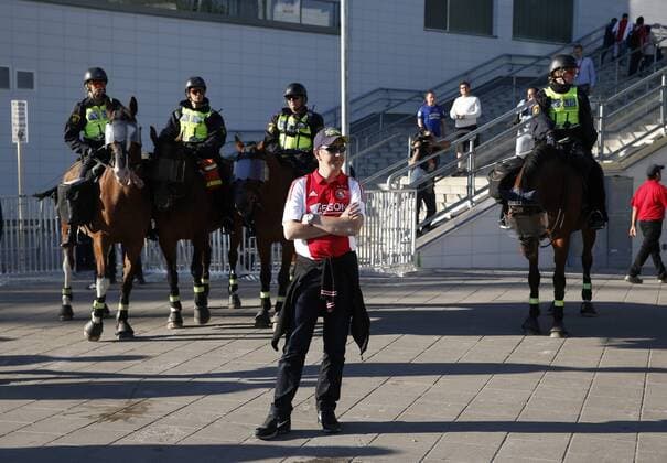 Police form a cordon as fans arrive during the UEFA Europa League Final match at the Friends Arena, Stockholm. Picture date: May 24th, 2017.Picture credit should read: Matt McNulty Sportimage EDITORIAL USE ONLY. No use with unauthorised audio, video, data, fixture lists, club league logos or live services. Online in-match use limited to 120 images, no video emulation. No use in betting, games or single club league player publications.