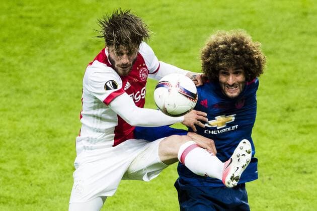 Bilder des Tages - SPORT 170524 Ajax Lasse Schöne i en nickduell med Manchester Uniteds Marouane Fellaini under finalen i Europa League mellan Ajax och Manchester United ManU den 24 maj 2017 i Stockholm.  Copyright: ANDREASxLxERIKSSON BB170524AE057