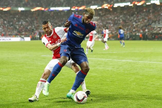 Hakim Ziyech of Ajax, Paul Pogba of Manchester Unitedduring the UEFA Europa League final match between Ajax Amsterdam and Manchester United ManU at the Friends Arena on May 24, 2017 in Stockholm, Sweden Ajax v Manchester United UEFA Europa League 2016 2017 xVIxVIxImagesx xMauricexvanxSteenxIVx 7861878