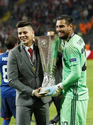 (L-R) Marcos Rojo of Manchester United ManU goalkeeper Sergio Romero of Manchester United with the Coupe UEFA, the UEFA cupduring the UEFA Europa League final match between Ajax Amsterdam and Manchester United at the Friends Arena on May 24, 2017 in Stockholm, Sweden Ajax v Manchester United UEFA Europa League 2016 2017 xVIxVIxImagesx xMauricexvanxSteenxIVx 7863955