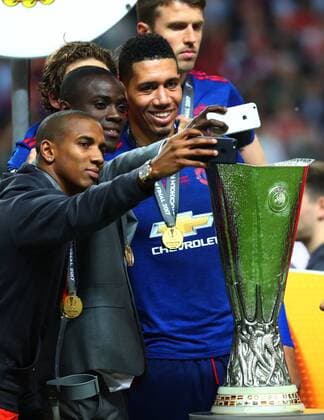 (170525) -- STOCKHOLM, May 25, 2017 -- Manchester United ManU s players take selfie photos with the trophy after winning the UEFA Europa League Final match between Manchester United and Ajax Amsterdam at the Friends Arena in Stockholm, Sweden, on May 24, 2017. Manchester United claimed the title by defeating Ajax Amsterdam 2-0. ) (SP)SWEDEN-STOCKHOLM-UEFA EUROPA LEAGUE-FINAL GongxBing 