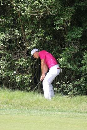 May 25th 2017, Virginia Water, Wentworth, Surrey, England; BMW PGA Golf Herren Championship golf, day 1; Thorbjorn Olesen playing his fourth shot out of the rough on 17 xDavidxKissmanx  ActionPlus11883360
