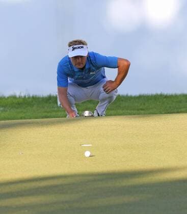 May 25th 2017, Virginia Water, Wentworth, Surrey, England; BMW PGA Golf Herren Championship golf, day 1; Soren Kjeldsen of Sweden lines up a birdie putt on the 18th xDavidxKissmanx  ActionPlus11883470