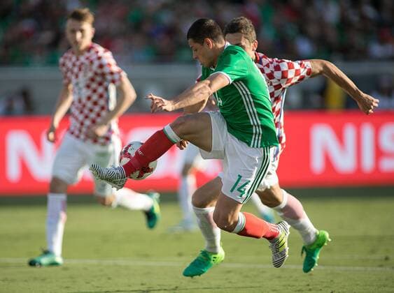 May 27, 2017 - Los Angeles, California, U.S - Javier Chicharito Hernandez 14 of Mexico battles for the ball during their friendly game with Croatia on Saturday May 27, 2017 at Los Angeles Coliseum in Los Angeles, California. Hernandez scored his 47th goal for Mexico to set the national team Nationalteam s all-time record. Croatia defeated Mexico 2-1. Mexico vs. Croatia - ZUMAp124 20170527_zaa_p124_009 Copyright: xArianaxRuizx