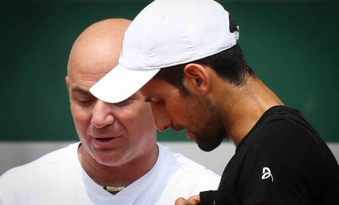 Serbian Novak Djokovic and his new coach Andre Agassi pictured during a training practice at the Roland Garros French Open tennis tournament, in Paris, France, Sunday 28 May 2017. The Roland Garros Grand Slam takes place from 22 May to 11 June 2017. VIRGINIExLEFOUR  x05105126x