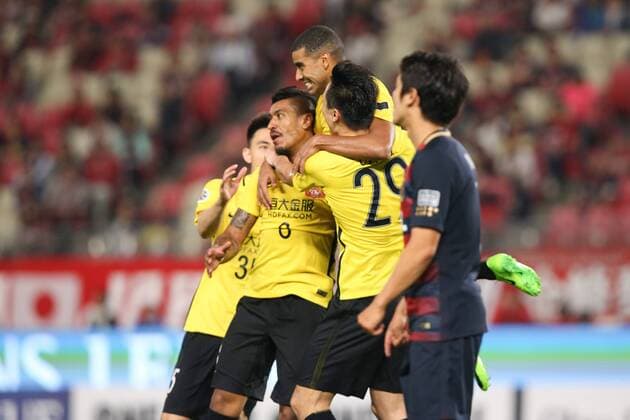 Brazilian football player Paulinho of China s Guangzhou Evergrande celebrates with his teammates after scoring a goal against Japan s Kashima Antlers before their second Round of 16 match during the 2017 AFC Champions League in Kashima, Japan, 30 May 2017. Kashima Antlers defeated Guangzhou Evergrande 2-1 in their second Round of 16 match during the 2017 AFC Champions League in Kashima, Japan, 30 May 2017. Kashima Antlers defeats Guangzhou Evergrande in second Round of 16 match at AFC Champions League  20170530_30405