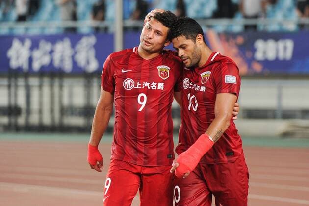 Brazilian football player Givanildo Vieira de Sousa, better known as Hulk, right, and his teammate Brazilian football player Elkeson of Shanghai SIPG celebrate after scoring a goal against Jiangsu Suning during their second Round of 16 match of the AFC Champion League 2017 in Nanjing city, east China s Jiangsu province, 31 May 2017. Jiangsu Suning was defeated by Shanghai SIPG 2-3. Hulk and Elkeson help Shanghai SIPG beat Jiangsu Suning in second Round of 16 at AFC Champions League  20170531_49152