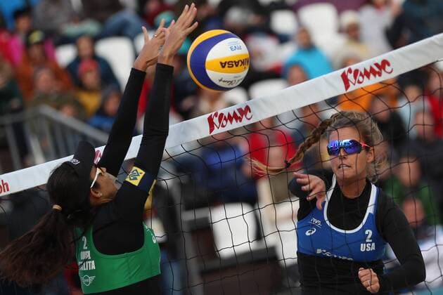 MOSCOW, RUSSIA â€“ JUNE 4, 2017: Talita Antunes (L) of Brazil tries to block Brooke Sweat of the United Statesin the final match at the Moscow leg of the 2017 FIVB Beach volleyball Beachvolleyball World Tour. Franca with her teammate Talita Antunes won the gold medal match 2-0. Sergei Savostyanov TASS  TS051A42
