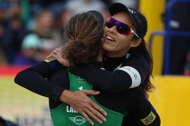 MOSCOW, RUSSIA â€“ JUNE 4, 2017: Larissa Franca (L) and Talita Antunes of Brazil hug during the final match against US Brooke Sweat and Summer Ross at the Moscow leg of the 2017 FIVB Beach volleyball Beachvolleyball World Tour. Antunes and Franca won the gold medal match 2-0. Sergei Savostyanov TASS  TS051A46