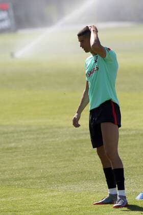 June 7, 2017 - Lisbon, Portugal - Portugal s forward Cristiano Ronaldo scratches his new haircut during a training session at Cidade do Futebol (Football City) training camp in Oeiras, outskirts of Lisbon on June 7, 2017, ahead of the FIFA World Cup WM Weltmeisterschaft Fussball Russia 2018 qualifier match Latvia vs Portugal. Portugal Training and press conference PK Pressekonferenz  - ZUMAn230 20170607_zaa_n230_103 Copyright: xPedroxFiuzax