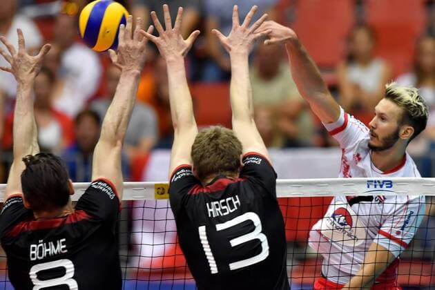 VOLLEYBALL - FIVB, AUT vs GER LINZ,AUSTRIA,09.JUN.17 - VOLLEYBALL - FIVB World League Tournament, Austria vs Germany. Image shows Marcus Boehme, Simon Hirsch (GER) and Lorenz Koraimann (AUT). GEPAxpictures xFlorianxErtl