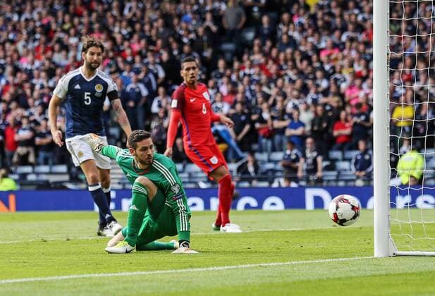 Scotland s Craig Gordon can only watch as England s opening goal goes in during the FIFA World Cup WM Weltmeisterschaft Fussball Qualifying match at Hampden Park Stadium, Glasgow Picture date 10th June 2017. Picture credit should read: David Klein Sportimage EDITORIAL USE ONLY. No use with unauthorised audio, video, data, fixture lists, club league logos or live services. Online in-match use limited to 120 images, no video emulation. No use in betting, games or single club league player publications.