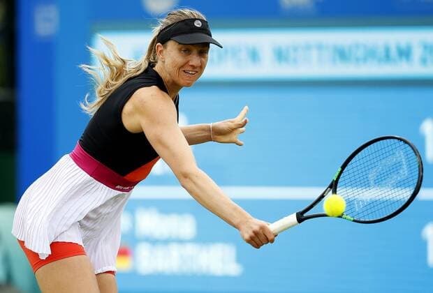Mona Barthel of Germany in action against Jana Fett of Croatia during the AEGON Nottingham Open 1st Round match at the Nottingham Tennis Centre. Picture date: June 12th, 2017. Picture credit should read: Matt McNulty Sportimage EDITORIAL USE ONLY. No use with unauthorised audio, video, data, fixture lists, club league logos or live services. Online in-match use limited to 120 images, no video emulation. No use in betting, games or single club league player publications.