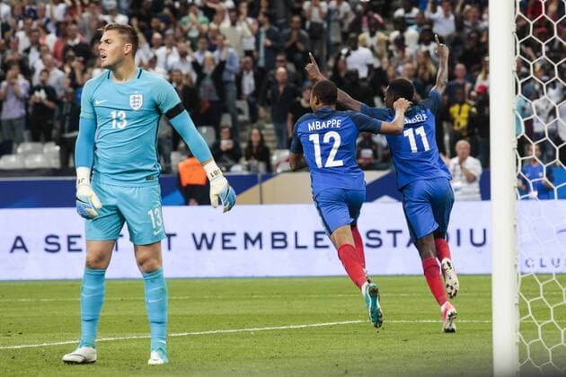 June 13, 2017 - Paris, France - France s forward Ousmane Dembele (R) and France s midfielder Kylian Mbappe (C) celebrate after scoring during the International Friendly Länderspiel football match between France and England, on June 13, 2017 at the Stade de France, in Saint-Denis, north of Paris, France. France v England - International Friendly  - ZUMAn230 20170613_zaa_n230_219 Copyright: xGeoffroyxVanxDerxHasseltx