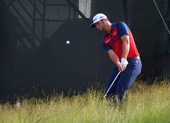 Jon Rahm hits from fescue on the 10th hole during round 1 of the 117th U.S. Open golf tournament at Erin Hill golf course in Erin, Wisconsin on June 15, 2017.  WIS20170615303 KEVINxDIETSCH