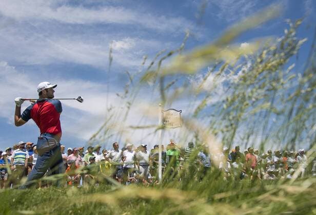 Jon Rahm hits off the 8th tee during round 1 of the 117th U.S. Open golf tournament at Erin Hill golf course in Erin, Wisconsin on June 15, 2017.  WIS20170615327 KEVINxDIETSCH