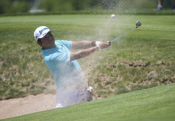 Hideki Matsuyama hits out of a bunker on the 8th fairway during round 1 of the 117th U.S. Open golf tournament at Erin Hill golf course in Erin, Wisconsin on June 15, 2017.  WIS20170615336 KEVINxDIETSCH