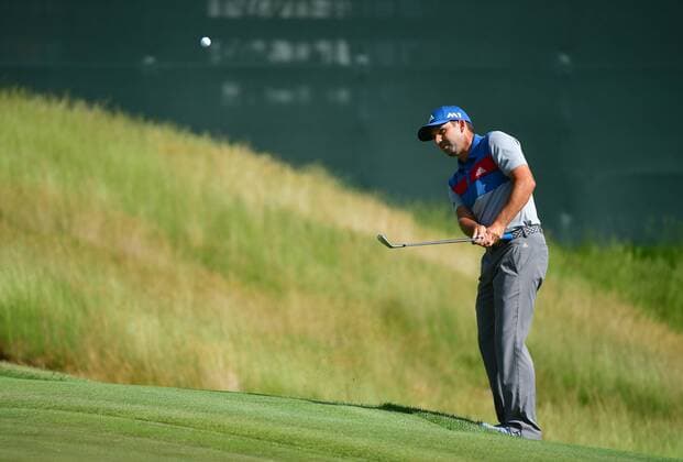 Sergio Garcia chips onto the 10th green during round 1 of the 117th U.S. Open golf tournament at Erin Hill golf course in Erin, Wisconsin on June 15, 2017.  WIS20170615350 KEVINxDIETSCH